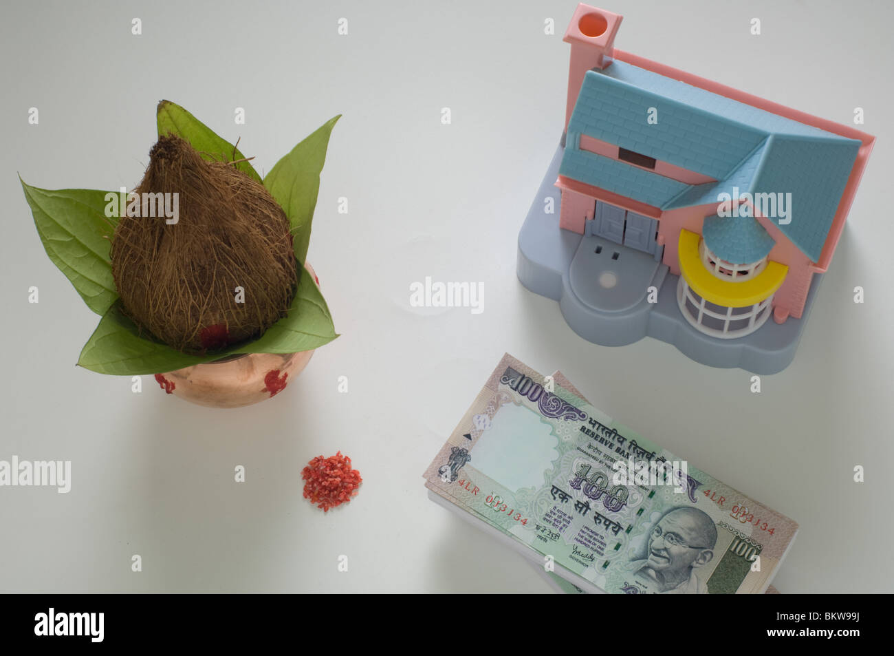 Traditional indian offerings with doll house and bundle of indian