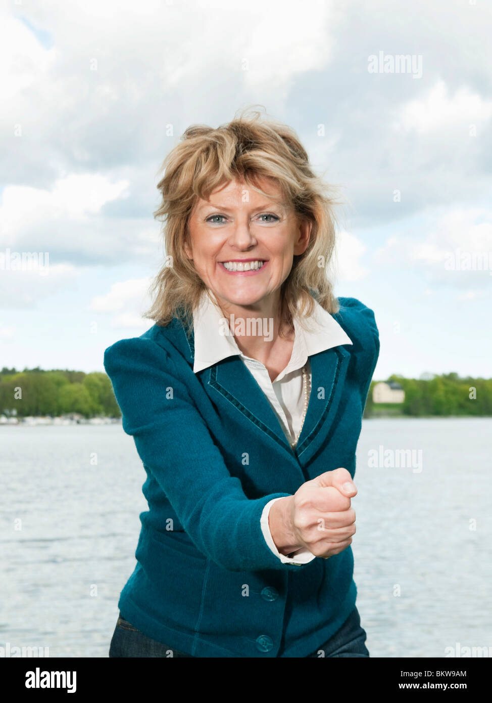 Woman standing in nature hi-res stock photography and images - Alamy