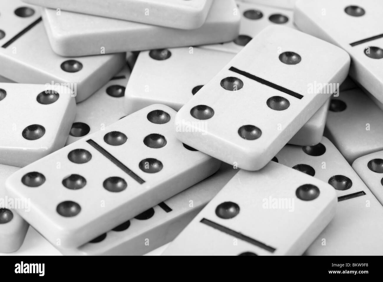 The old gray dominoes with black spots close up Stock Photo