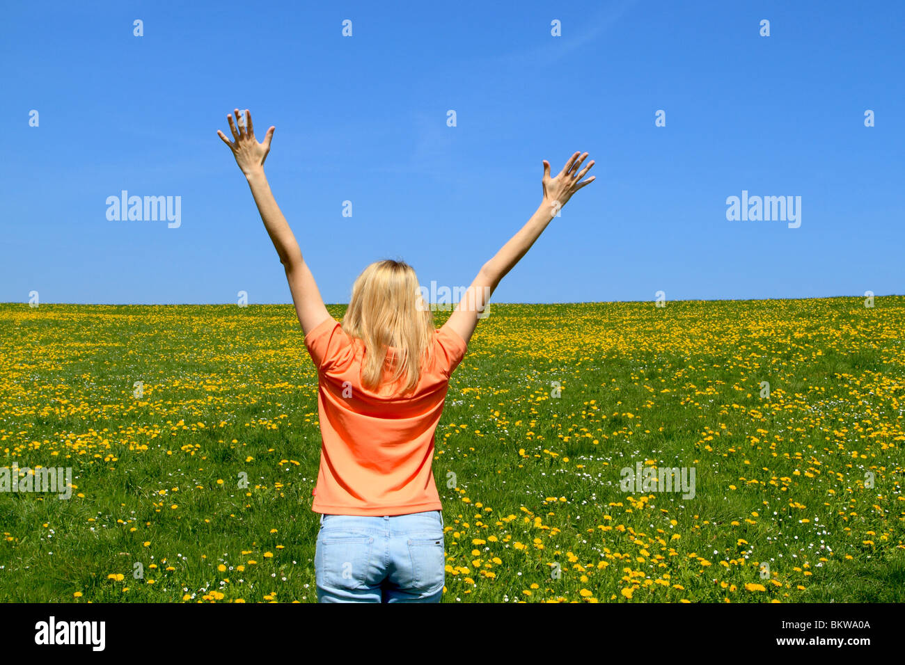 Happy young woman in spring Stock Photo