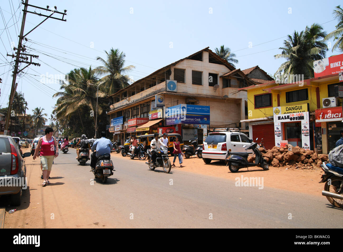 Candolim high street a medium sized town in Goa India. Stock Photo
