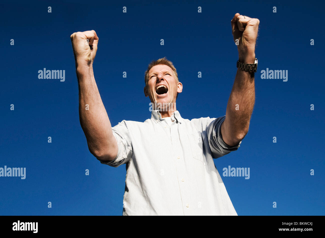 Cheering man hi-res stock photography and images - Alamy
