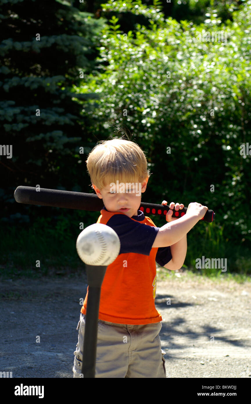 A young child plays tee ball Stock Photo Alamy
