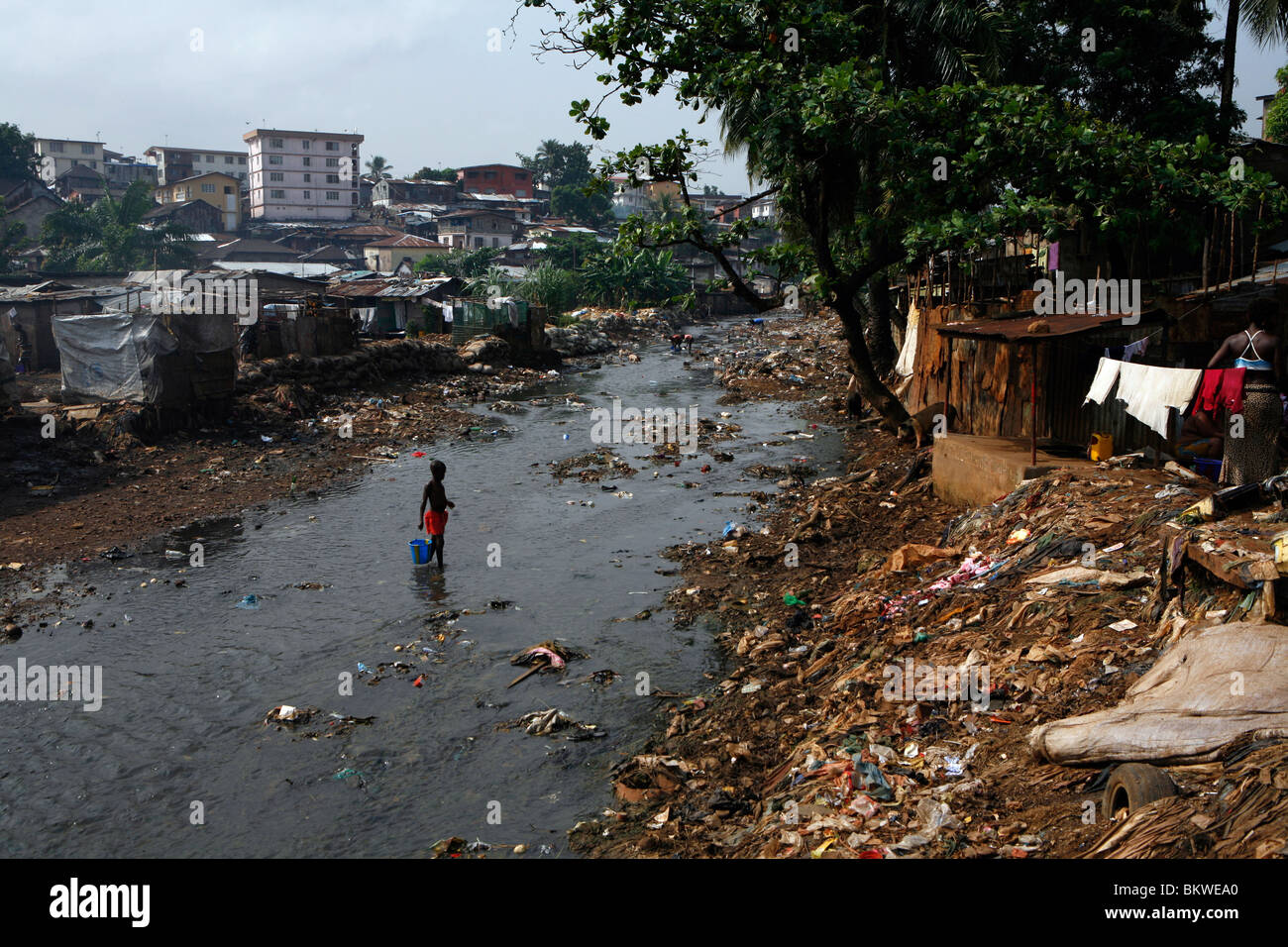 Stagnant river water at Kroo Bay shanty town, Freetown, Sierra Leone