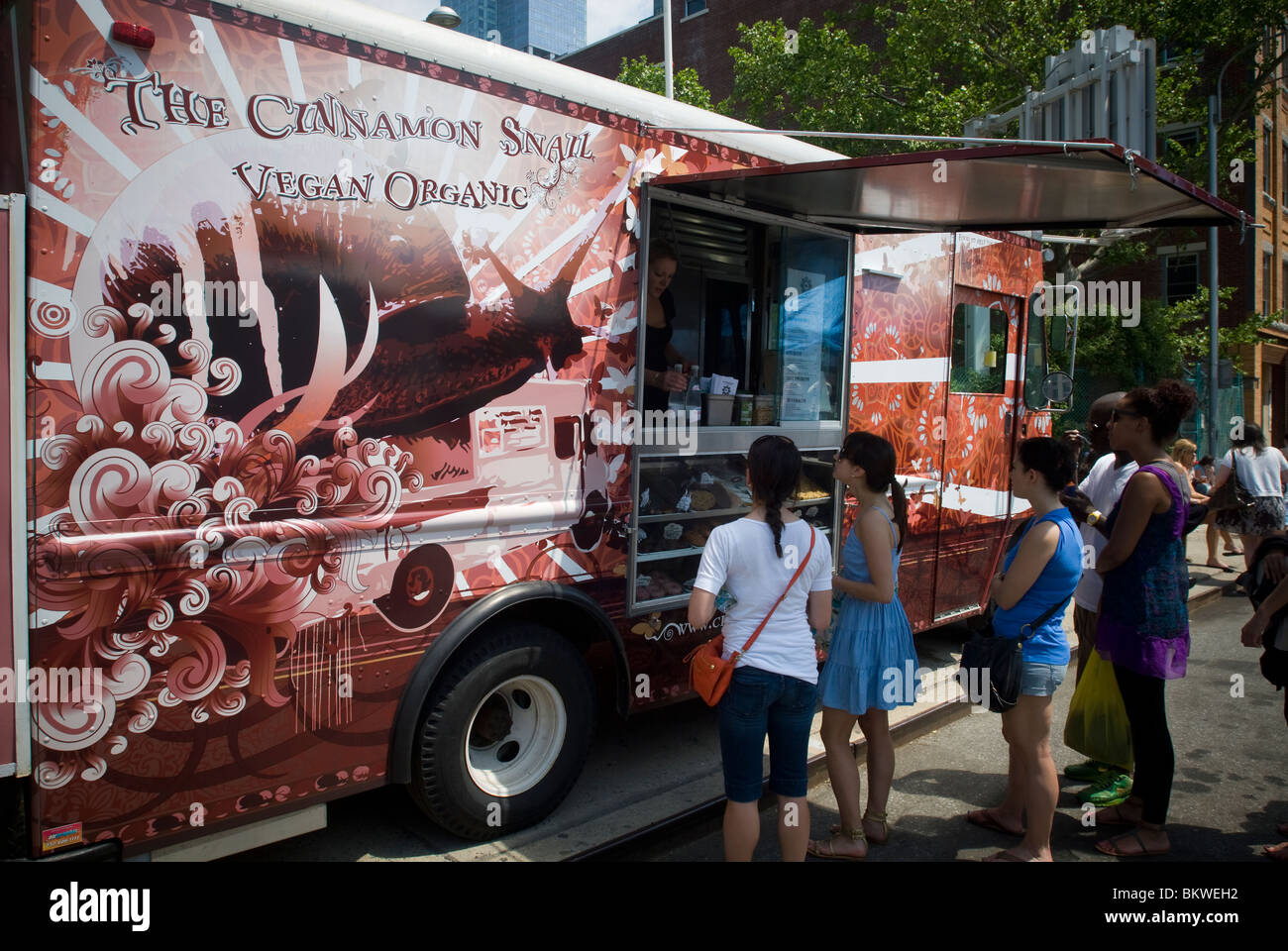 The Cinnamon Snail Vegan Organic truck is seen at the Hell's Kitchen Flea Market in New York Stock Photo