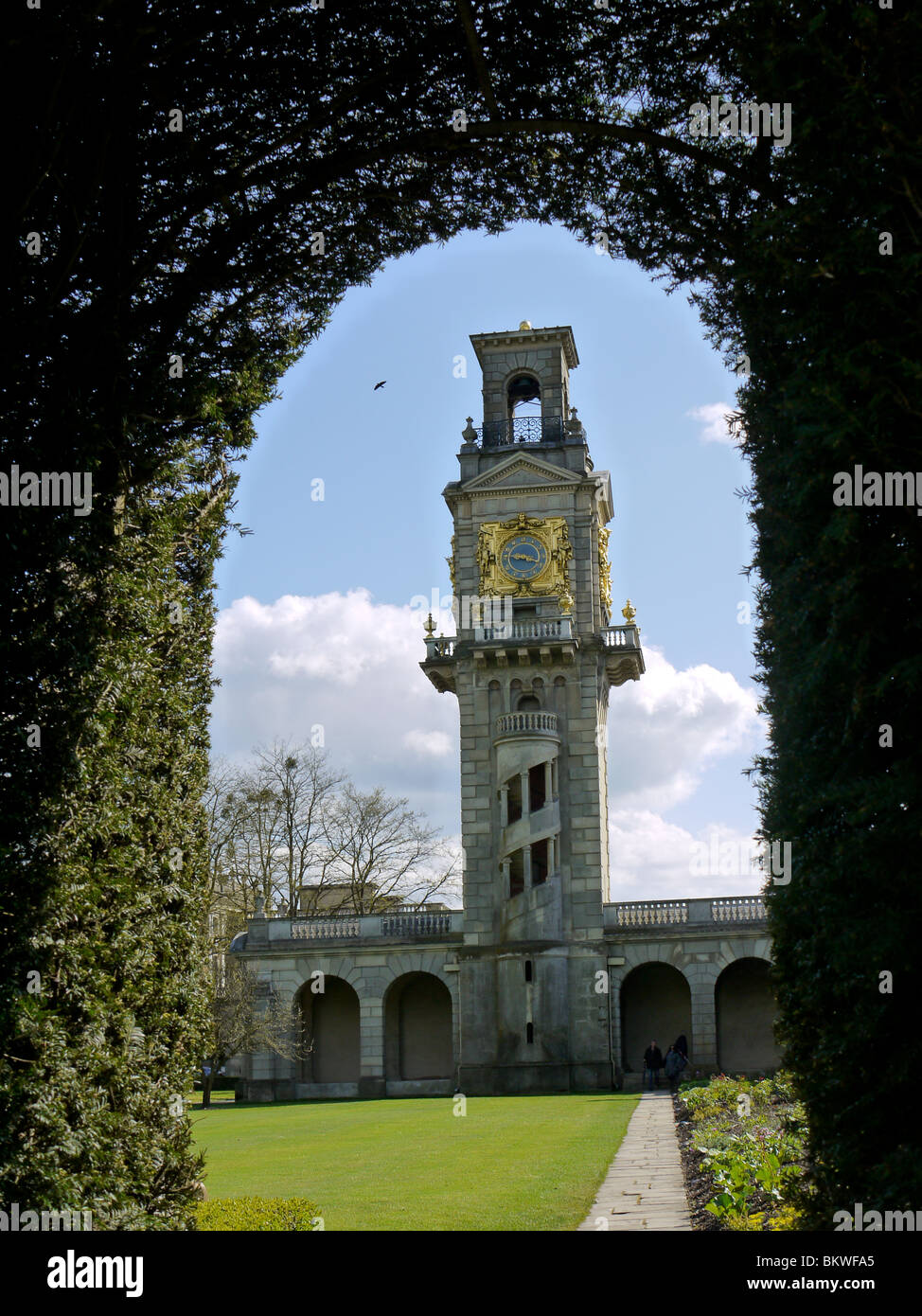 The Clock Tower seen from the secret garden at Cliveden, National Trust  Property Stock Photo