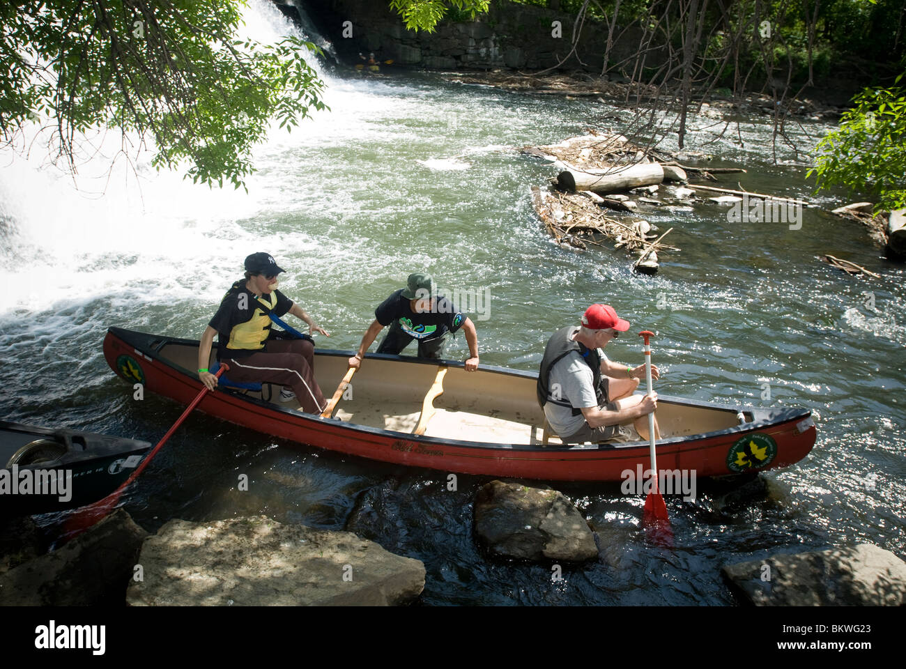 Canoes and kayaks at a portage on the Bronx River in the New York borough of Bronx Stock Photo