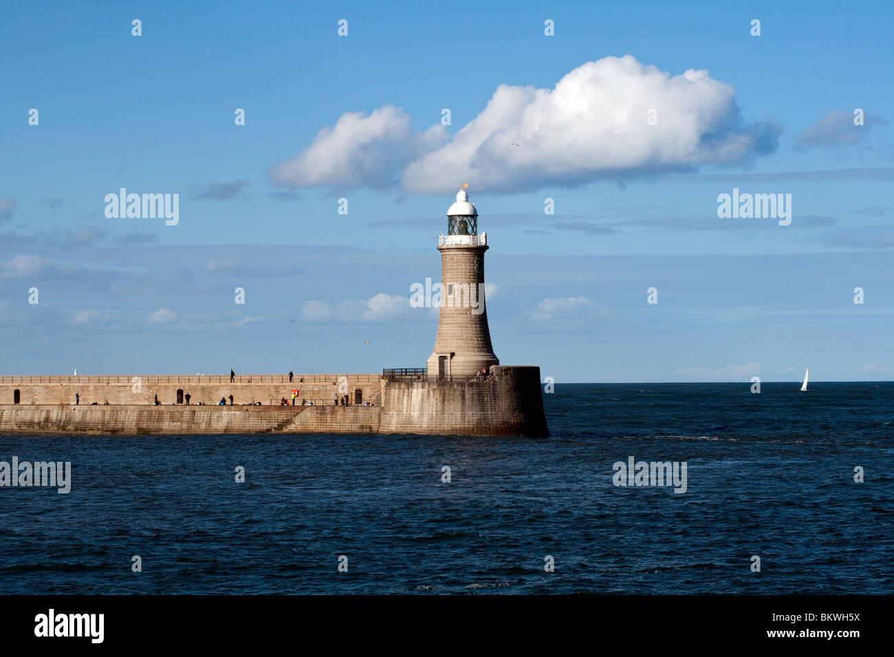 Tynemouth Lighthouse on the end of Tynemouth Pier, on the north east coast of England Stock Photo