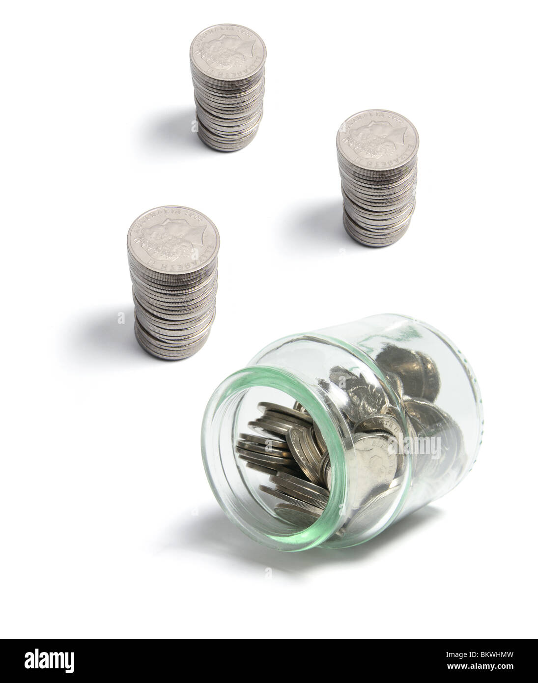 Coins in Glass Jar Stock Photo