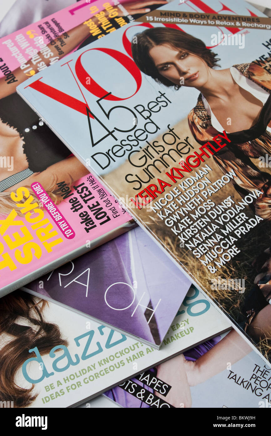 women magazine magazines reading fashion beauty vogue pile Stock Photo