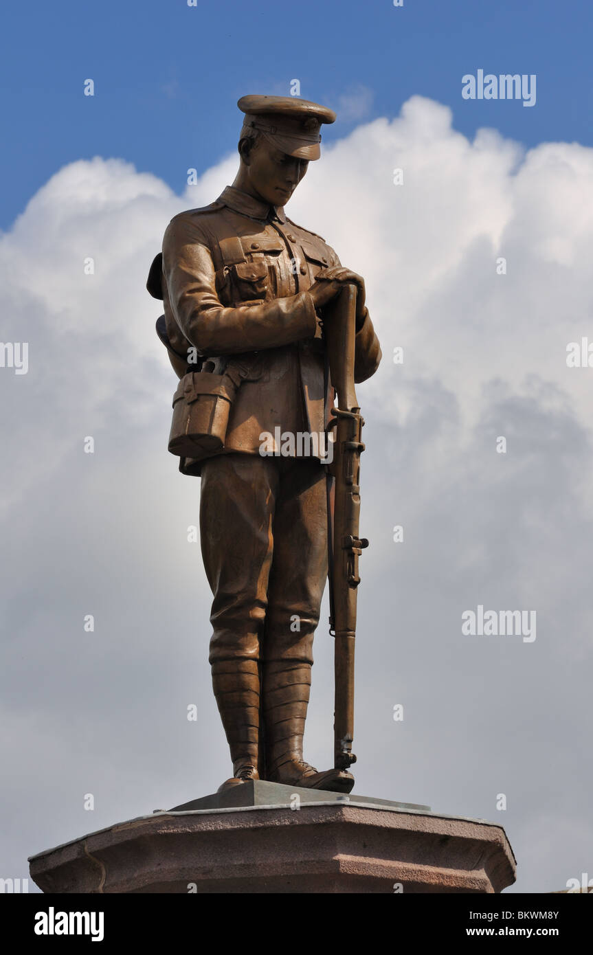 Statue of 1st World War soldier on top of the war memorial in Stock