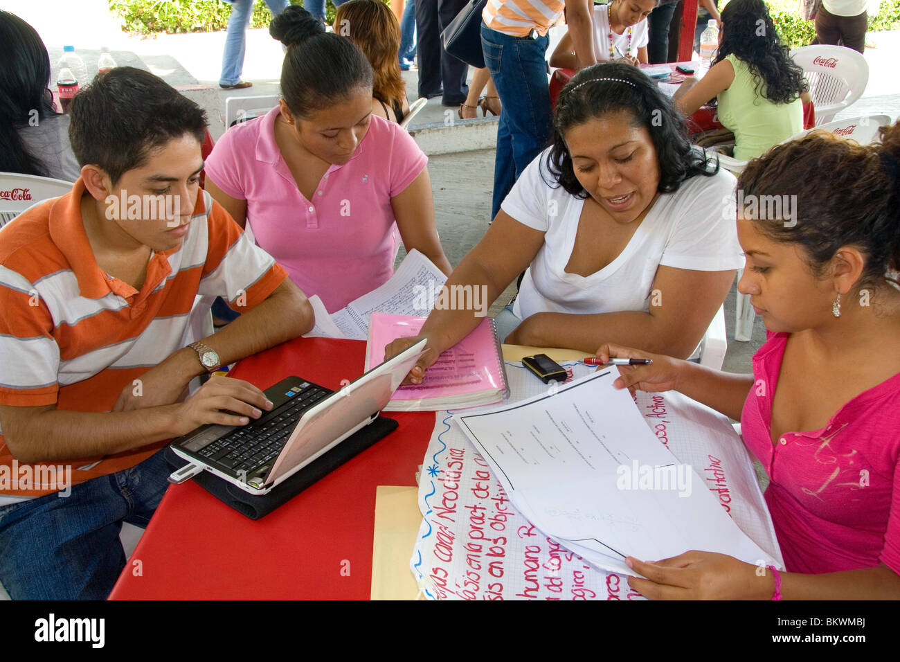 Mexican college students study together on the campus of Universidad Autonoma de Guerro located in Acapulco, Guerrero, Mexico. Stock Photo