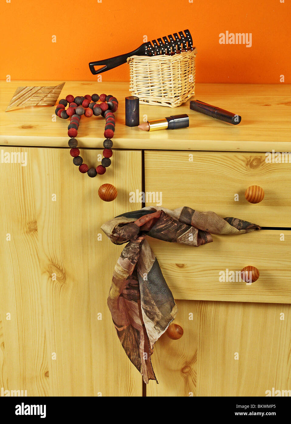 Color scarf hangs  from  of drawer Stock Photo