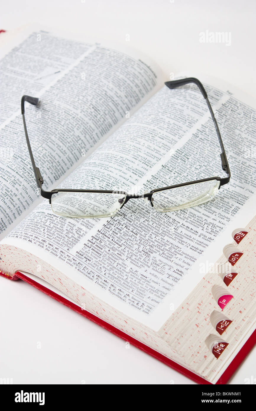 eyeglasses reading book education learn Stock Photo