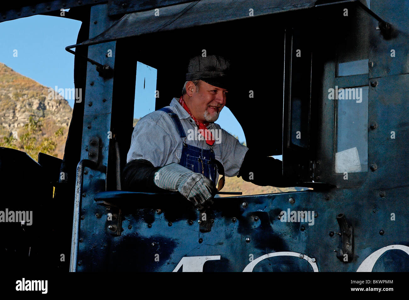 Stock photograph of engineer in cab of steam Durango and