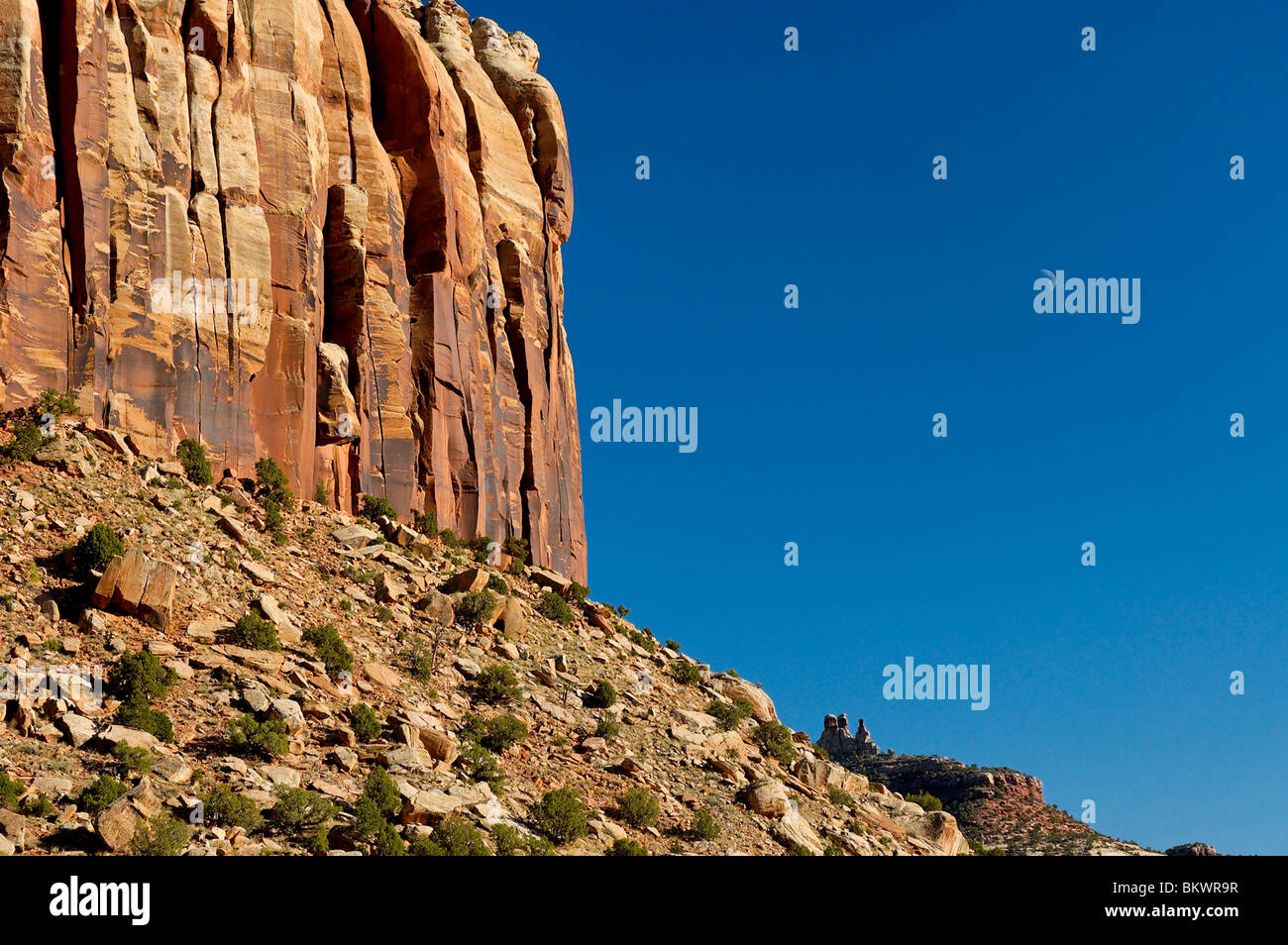 Stock photograph of  rocks and moon at Indian Creek near Needles area of Canyonlands National Park, Utah, USA. - Stock Image