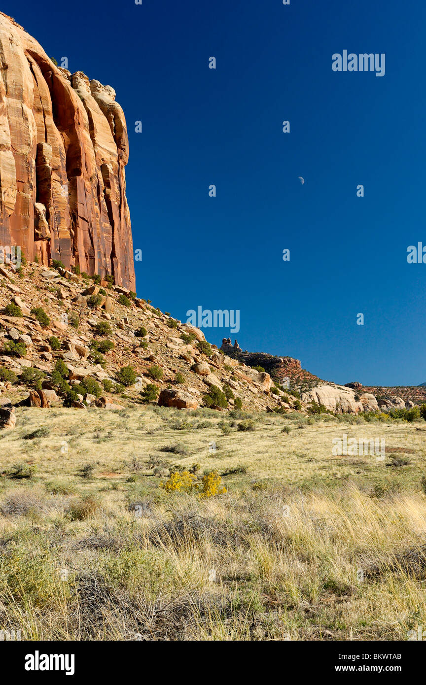 Stock photograph of  rocks and moon at Indian Creek near Needles area of Canyonlands National Park, Utah, USA. - Stock Image