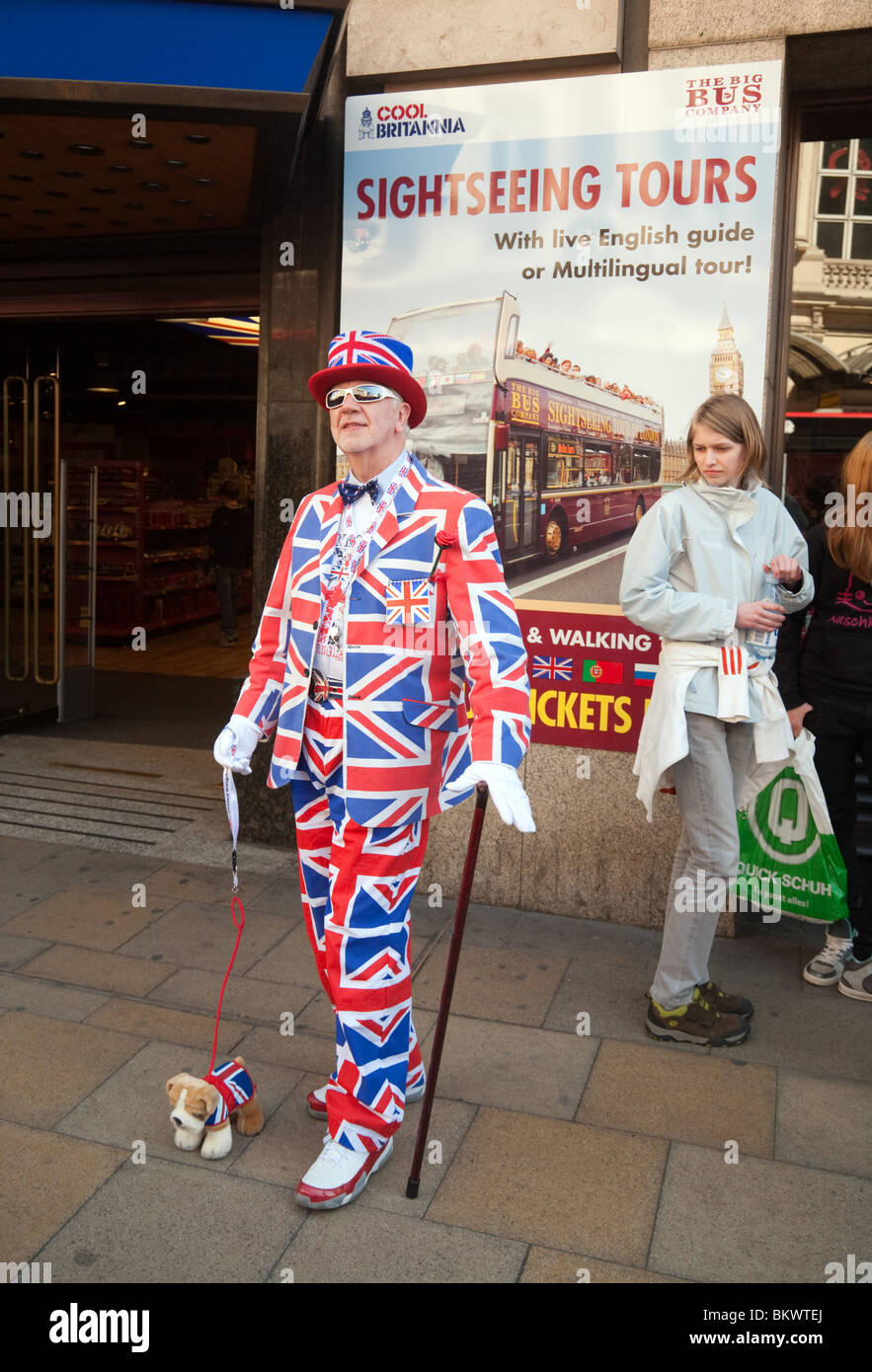 A man in a Union Jack outfit advertising for London bus tours, Piccadilly  Circus, London UK Stock Photo - Alamy