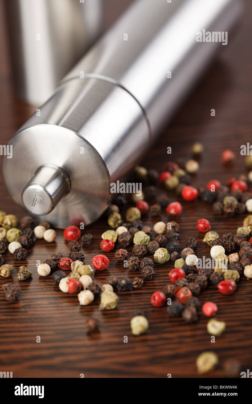 pepper mill on wooden table Stock Photo