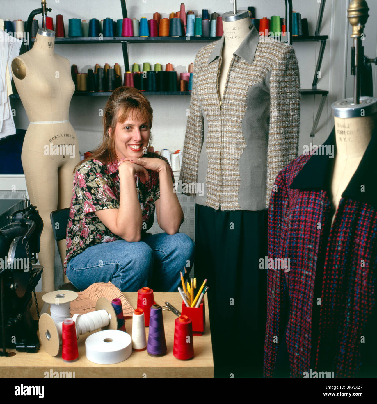 Environmental portrait of female entrepreneur in her design shop for the fashion industry Stock Photo