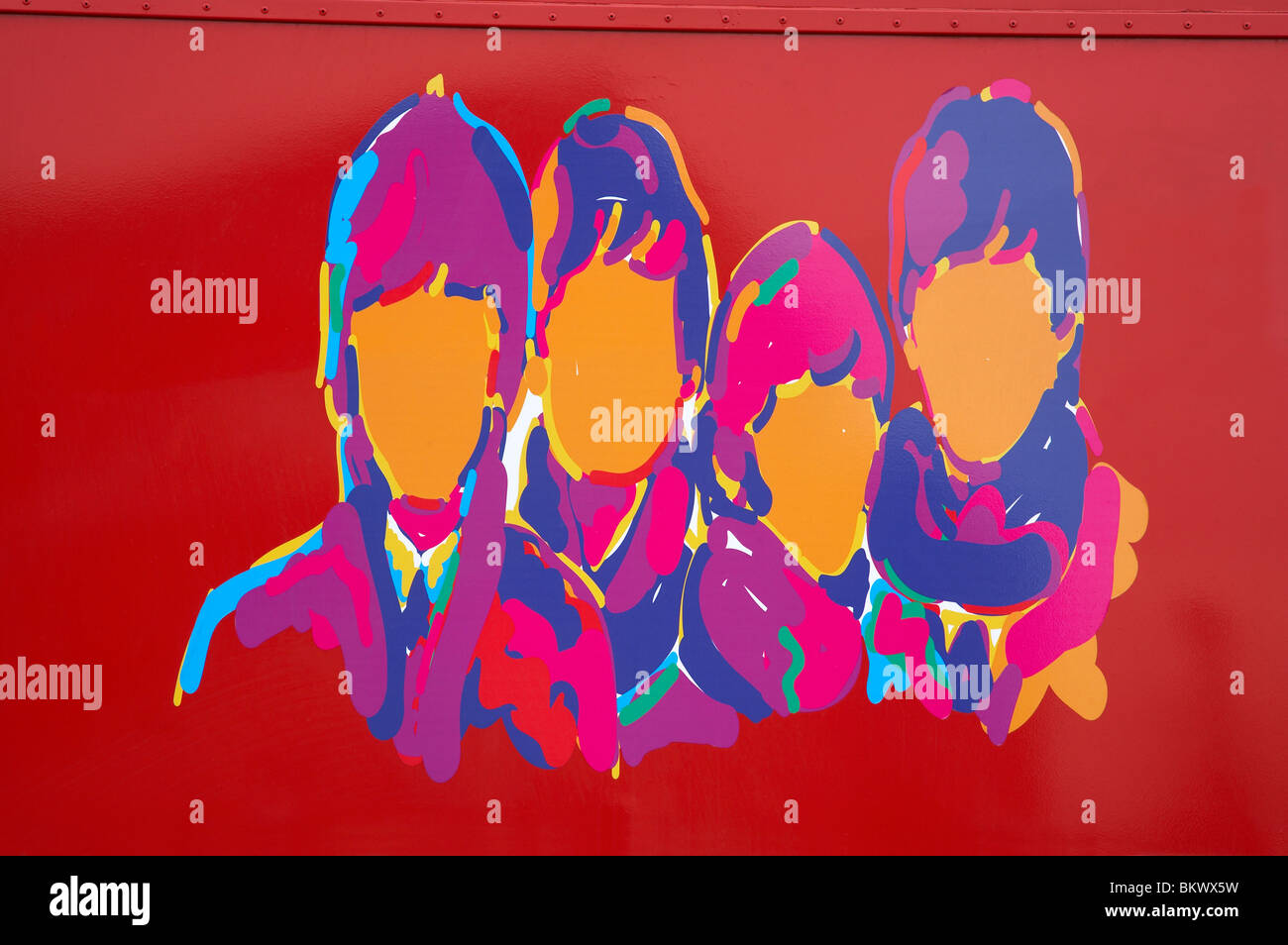 Beatles drawing on the back of a Citysightseeing bus in Liverpool UK Stock Photo