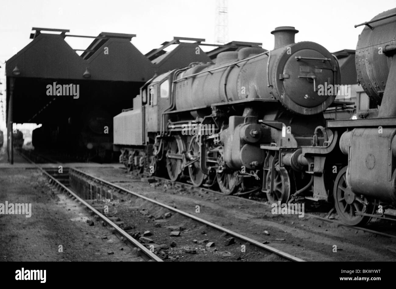 unknown engine standing at a maintenance depot during the last days of steam on british rail Stock Photo