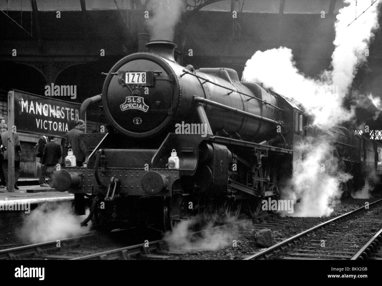 engine number 44871 black 5 class steams out of manchester victoria station on an excursion during the last days of steam Stock Photo