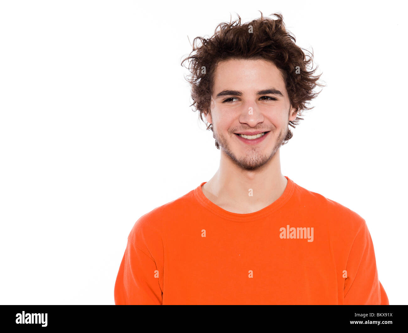 one young funky cool caucasian man portrait toothy smiling  in studio isolated on white background Stock Photo
