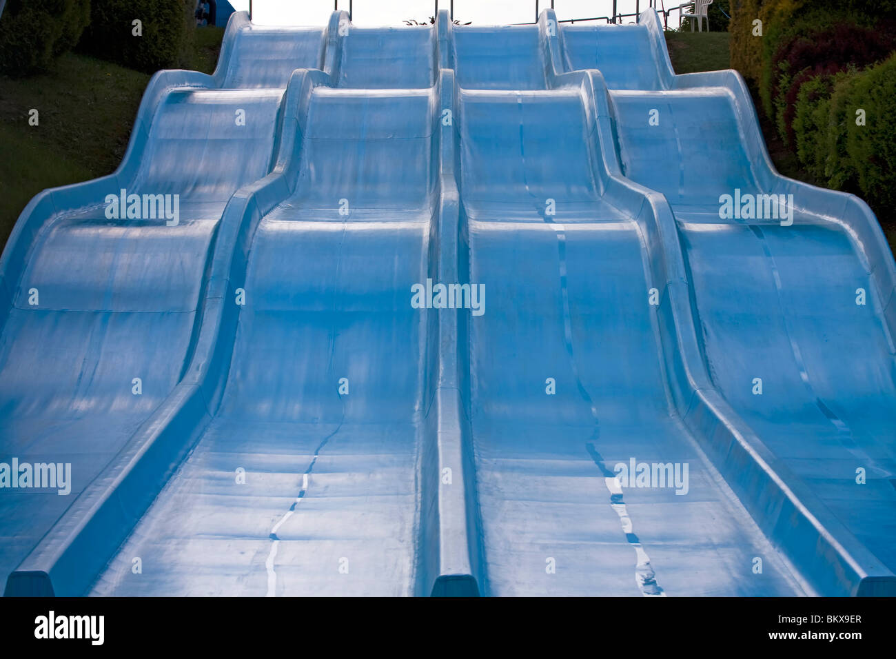 Four lanes wave water slide. Stock Photo