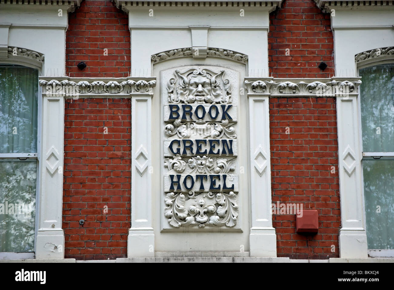 wall niche plaque with image of green man on exterior of the brook green hotel, brook green, hammersmith, london, england Stock Photo