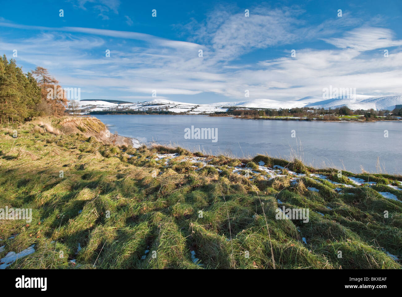 Looking across the ice covered Poulaphouca Reservoir in County Wicklow. Stock Photo