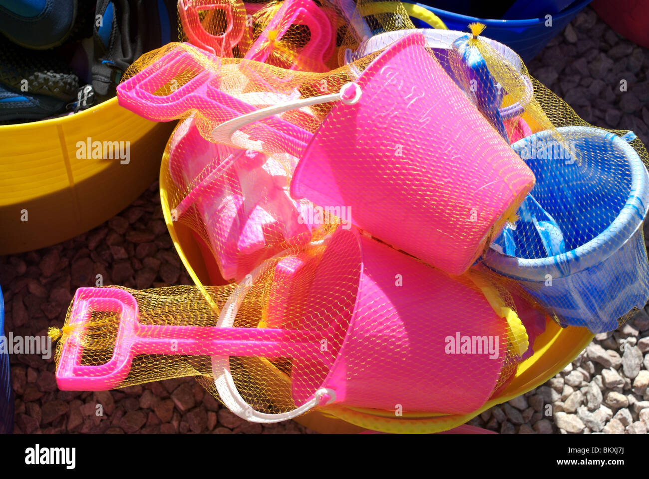 Colourful toy buckets and spades, Devon, UK Stock Photo Alamy