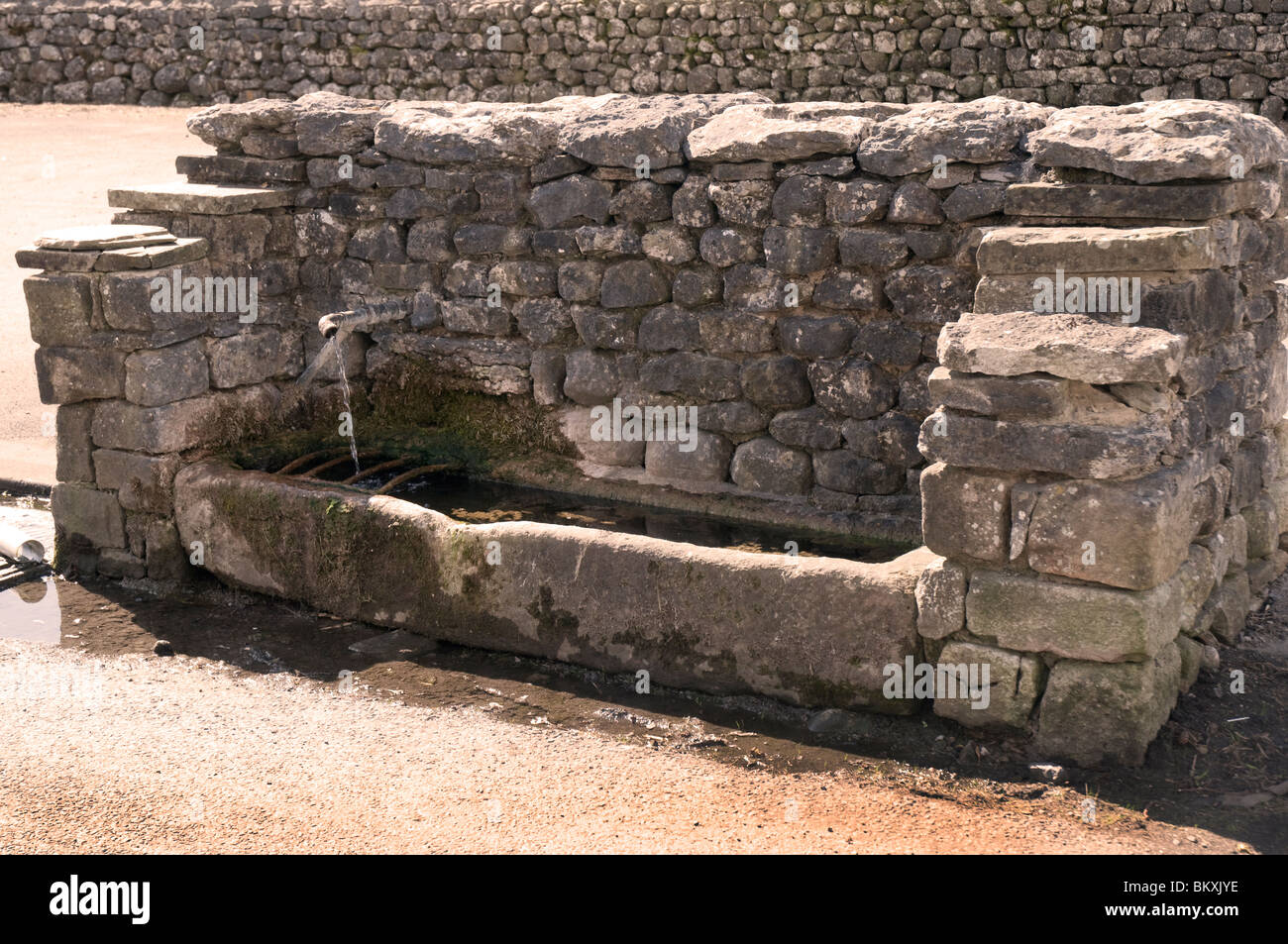 The village of Grassington in the Yorkshire Dales and a horse trough near Linton Falls Stock Photo