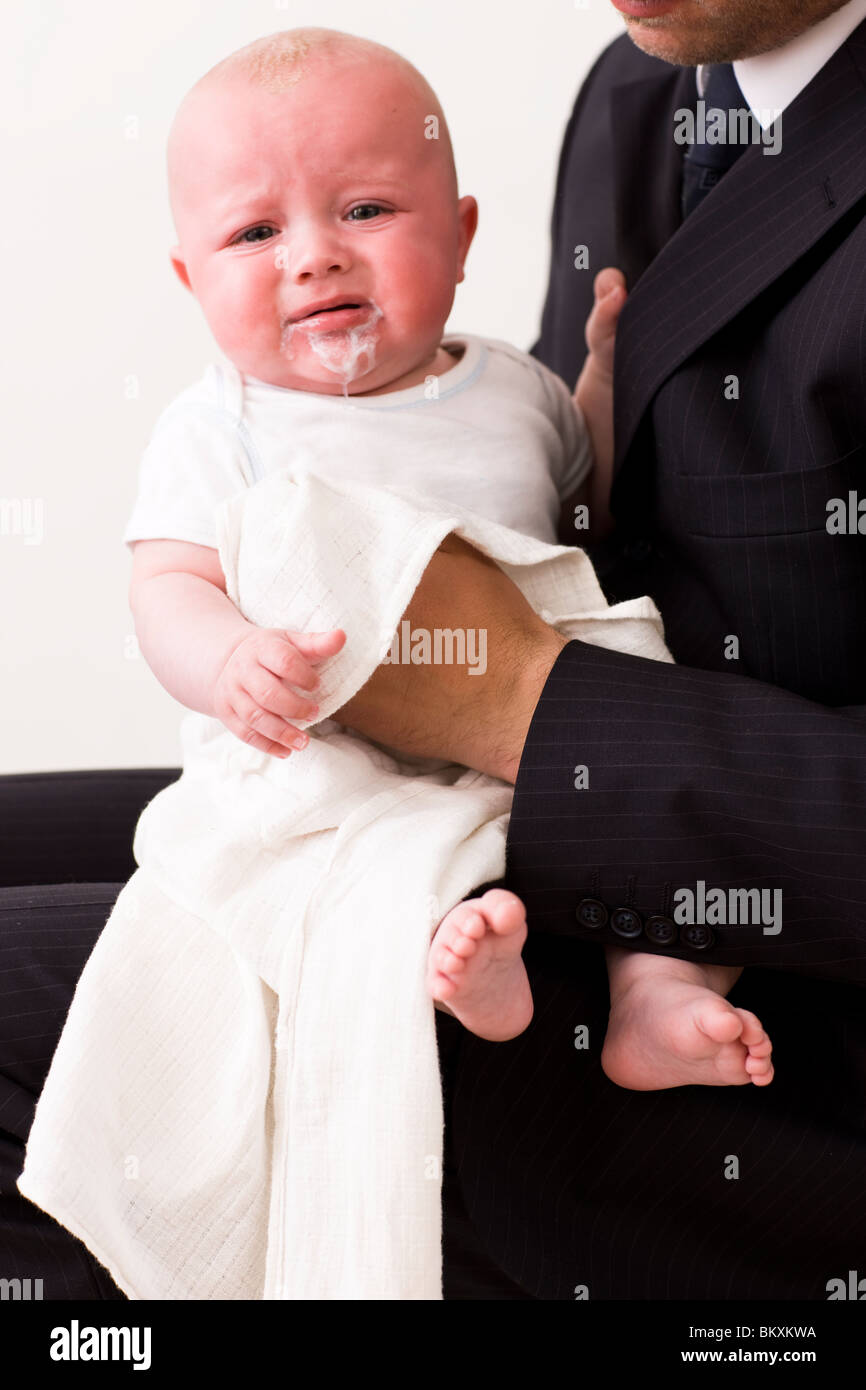 Burping baby sitting up on lap hires stock photography and images Alamy