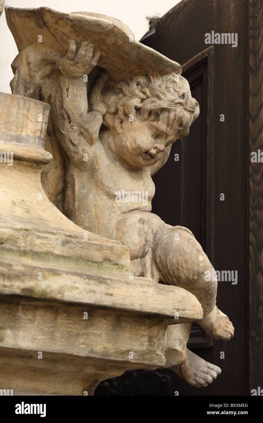 Cherub sculpture in Minoritsky cloister, Opava. Czech Republic. Stock Photo