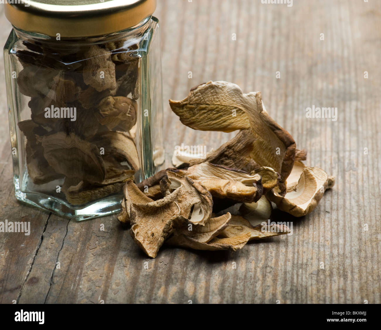 Dried Porcini Mushrooms With Storage Jar Stock Photo Alamy