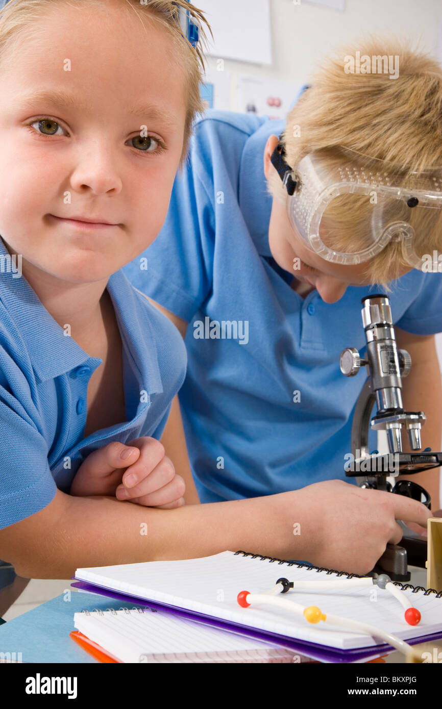 Two boys in a chemistry classroom Stock Photo - Alamy