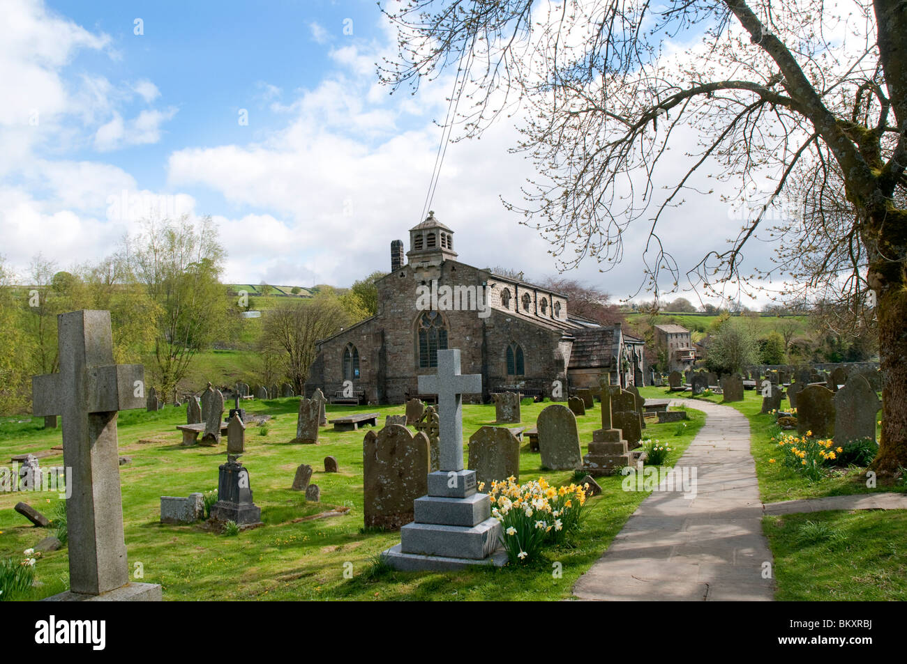 The village of Grassington in the Yorkshire Dales and the church of St Michael and all Angels near Linton Falls Stock Photo