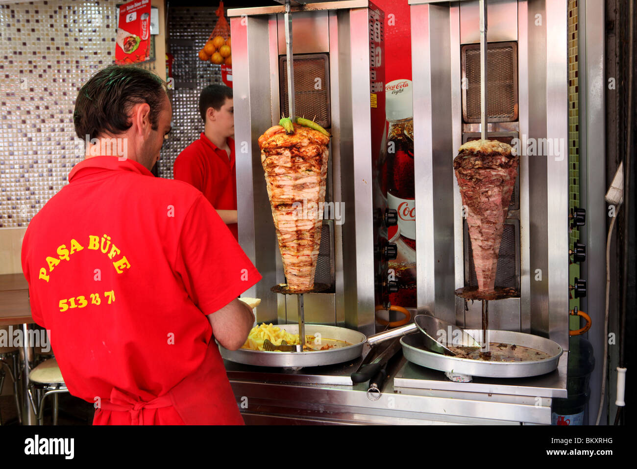 A man carving doner kebabs in Istanbul, the capital of Turkey Stock