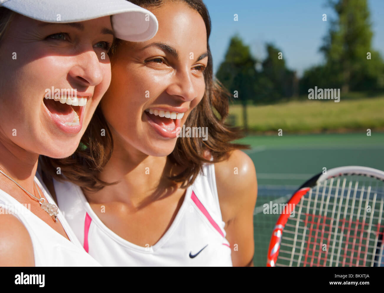 Close Up Of Two Female Tennis Players Screaming And Cheering Stock Photo Alamy