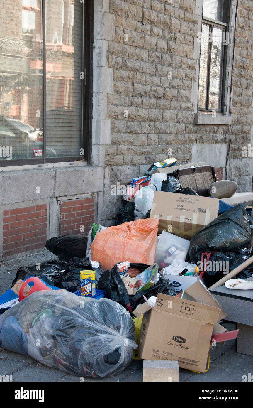 Garbage piled on a street Montreal Stock Photo Alamy