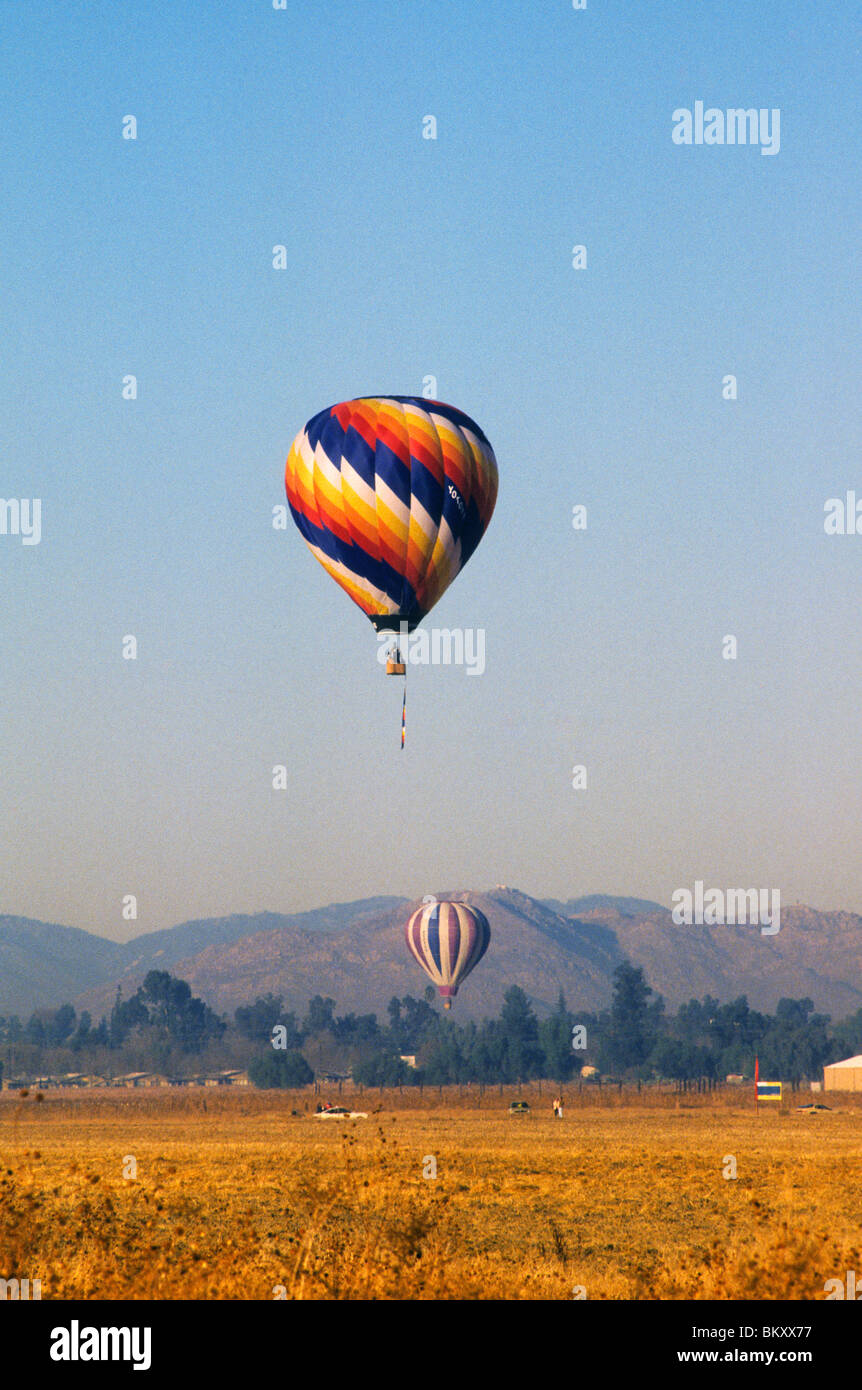 Hot-air balloon air rise fly sky color physics ascend sport compete ...