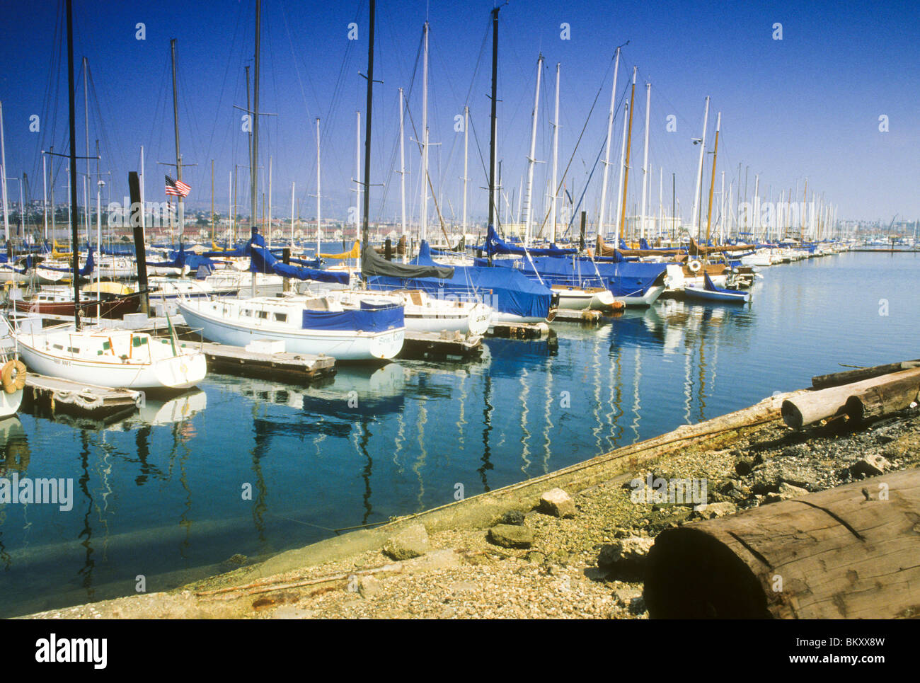 Boat marina dock mast sail park store sea ocean water sport recreation