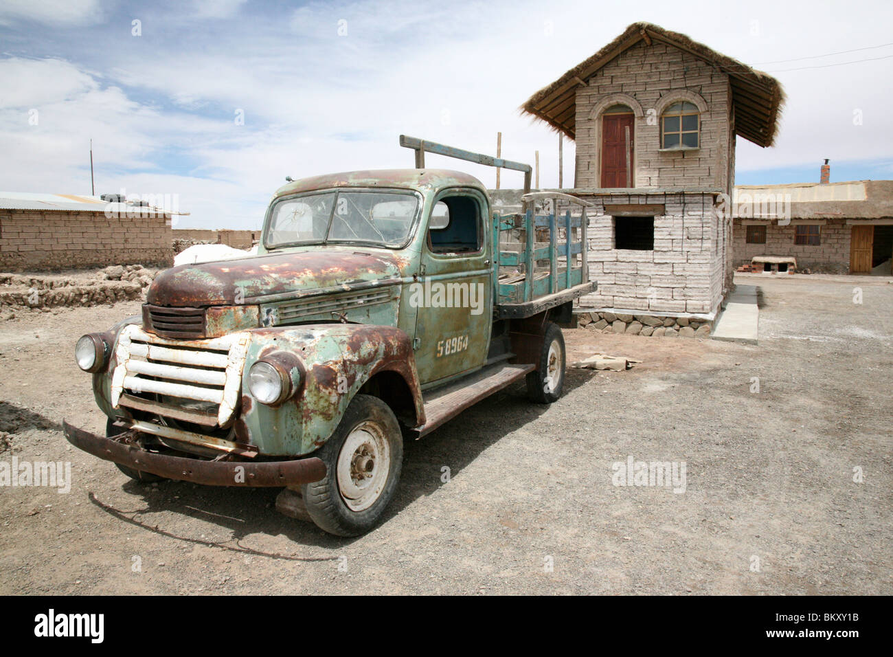 Old car on the Salt Flats, Bolivia Stock Photo