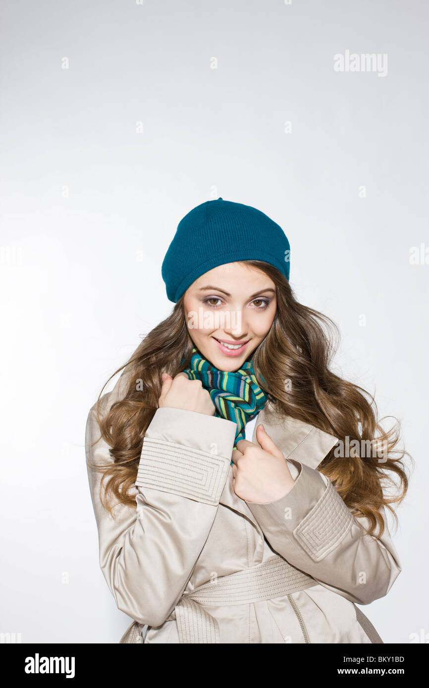 portrait of young woman in coat Stock Photo - Alamy