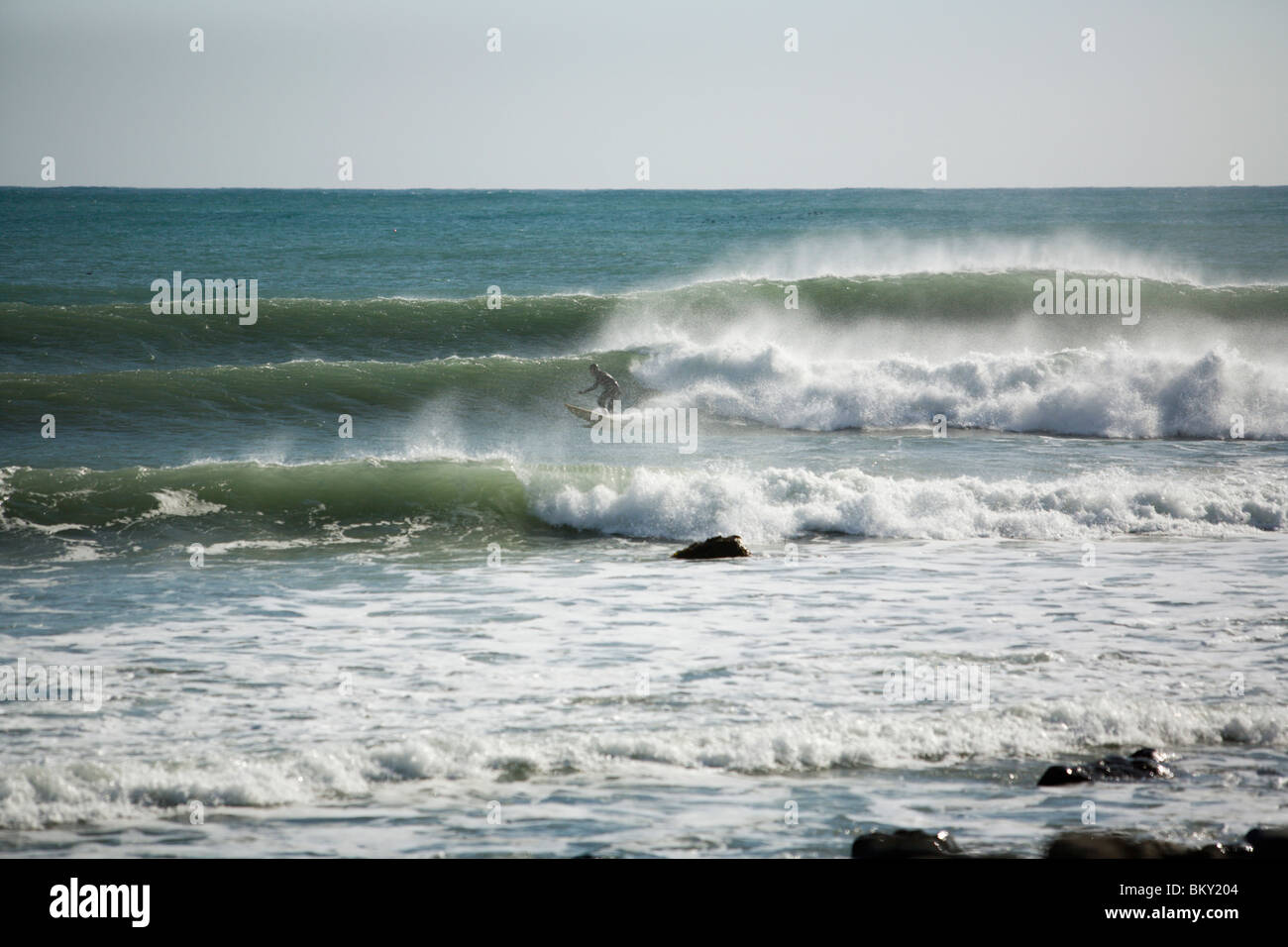 A man surfs on The Lost Coast, California Stock Photo Alamy