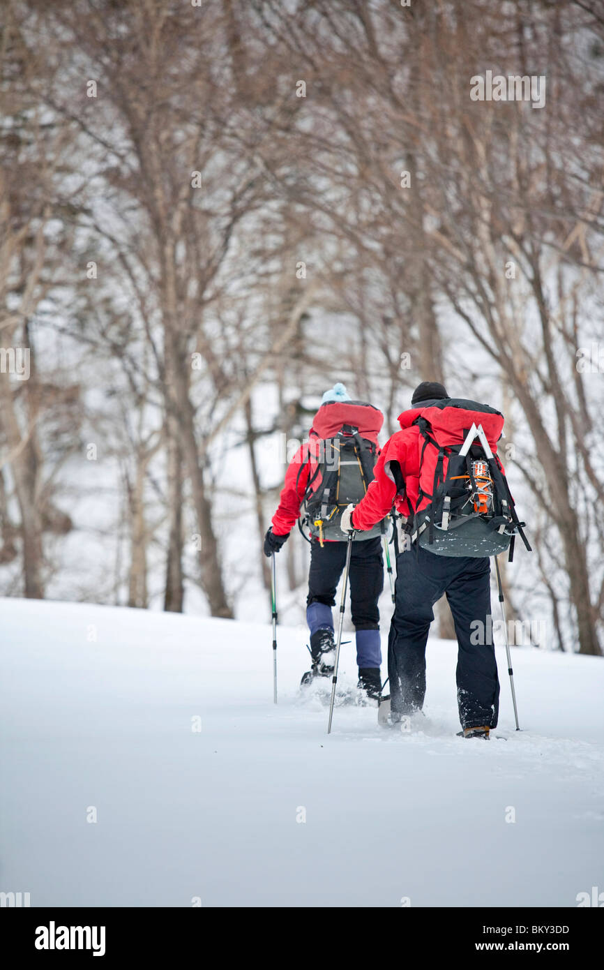 Two people snowshoeing in Sounkyo Daisetsuzan National Park