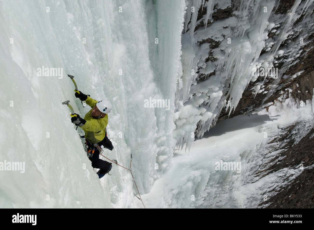 A man ice climbing u