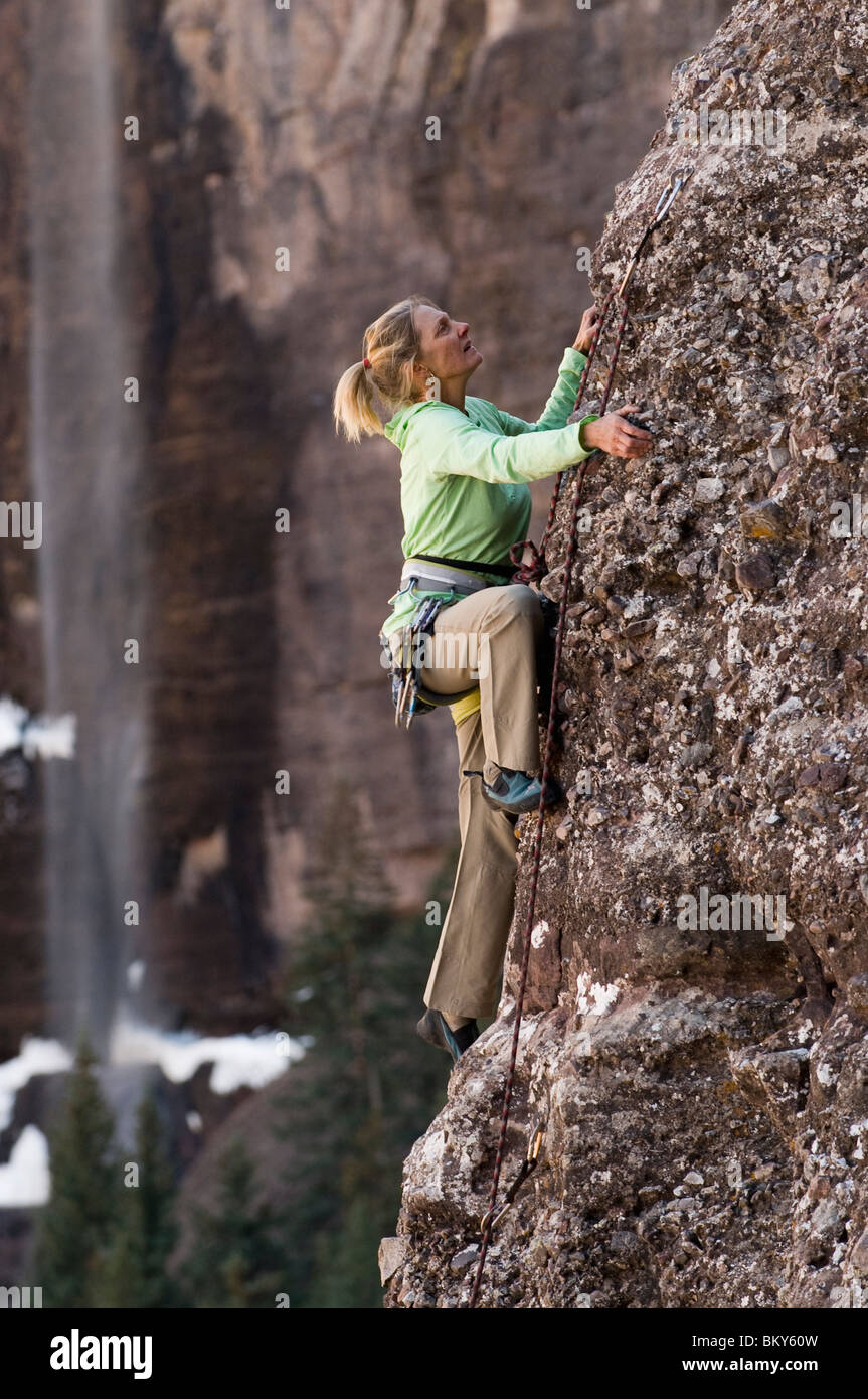 A woman climbing an arete, Telluride, Colorado. Stock Photo