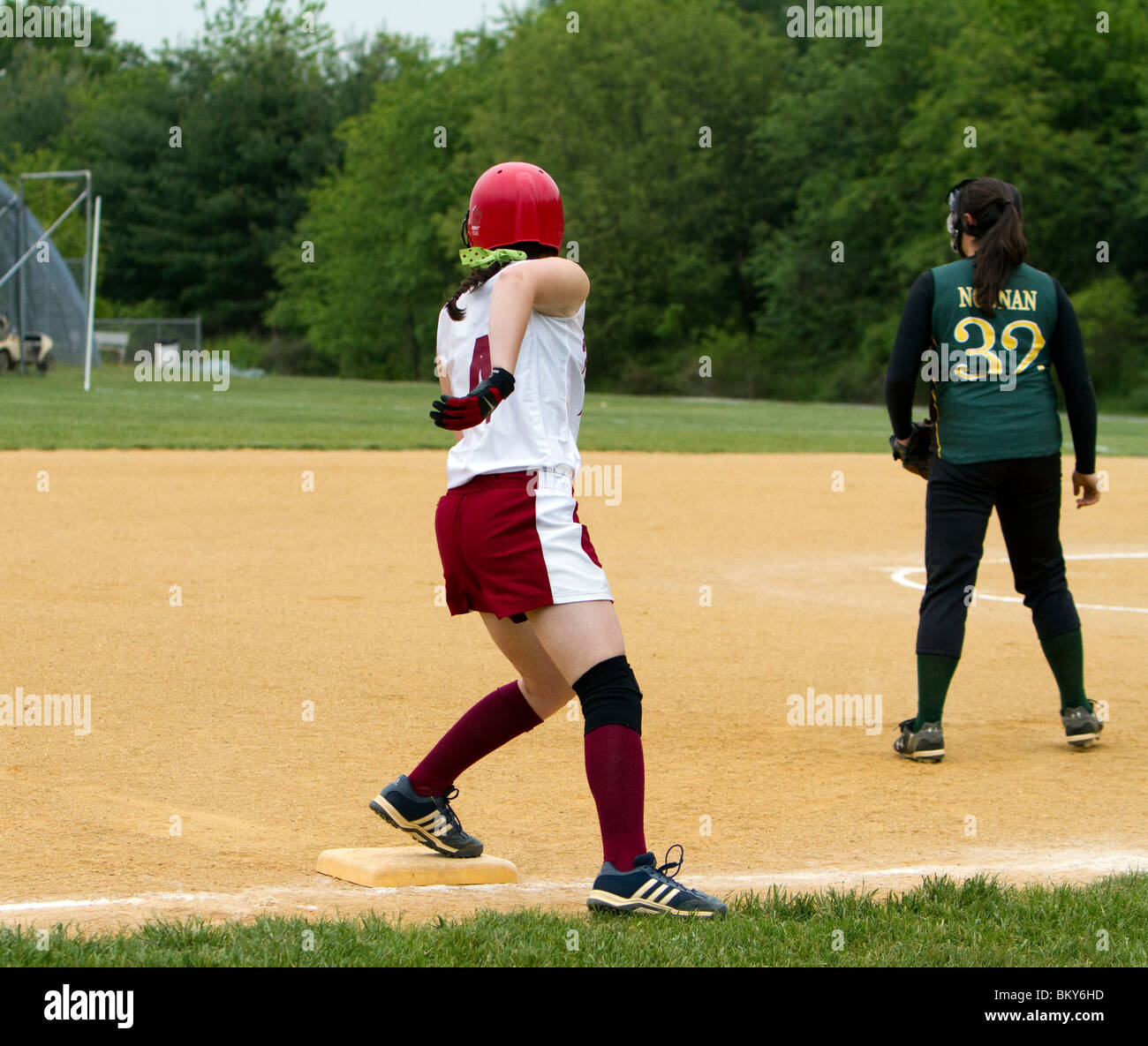 Girls high school softball. Catching running throwing. Teenage girls